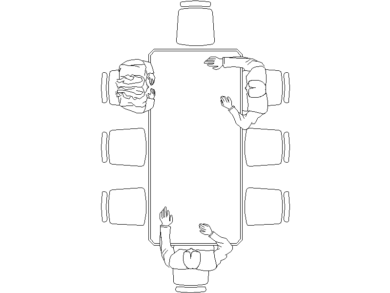 Tres personas en la mesa de reuniones